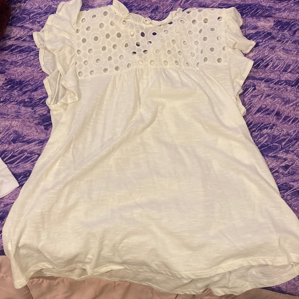 Brand new white lift shirt. Ties in the back. Size small